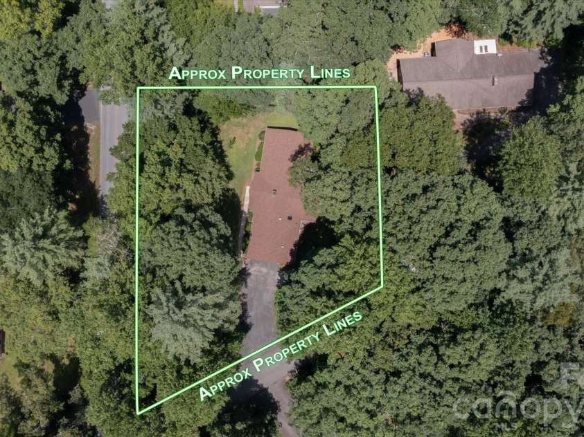 106 Laurel Lane, Etowah, NC 28729.  MLS# CAR4354319, YatesRealty ID 9161. Drone view 