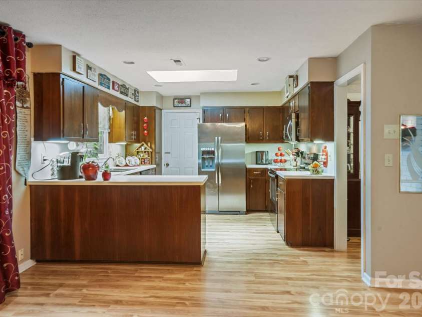 106 Laurel Lane, Etowah, NC 28729.  MLS# CAR4354319, YatesRealty ID 9161. Good sized Kitchen with a skylight