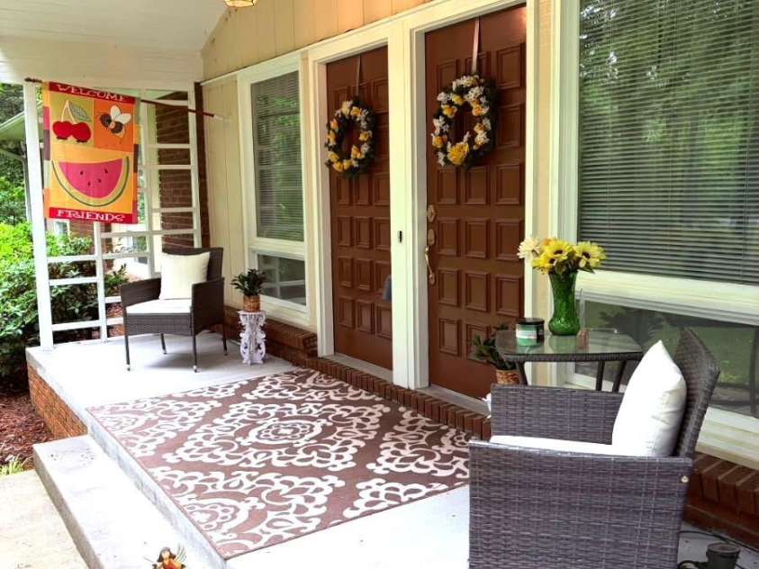 106 Laurel Lane, Etowah, NC 28729.  MLS# CAR4354319, YatesRealty ID 9161. Large covered front porch perfect for reading a book, morning coffee.
