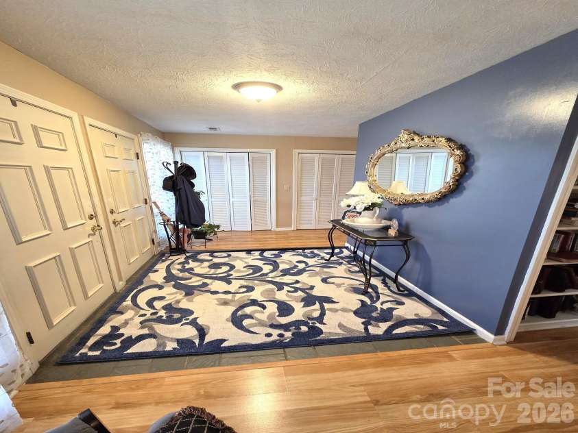 106 Laurel Lane, Etowah, NC 28729.  MLS# CAR4354319, YatesRealty ID 9161. LLarge entry with double closets