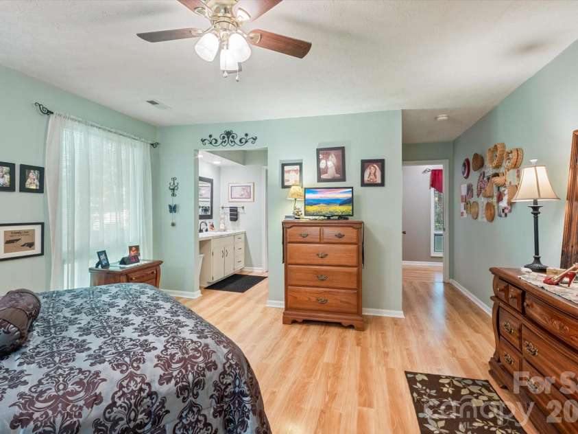 106 Laurel Lane, Etowah, NC 28729.  MLS# CAR4354319, YatesRealty ID 9161. Primary bedroom and bath