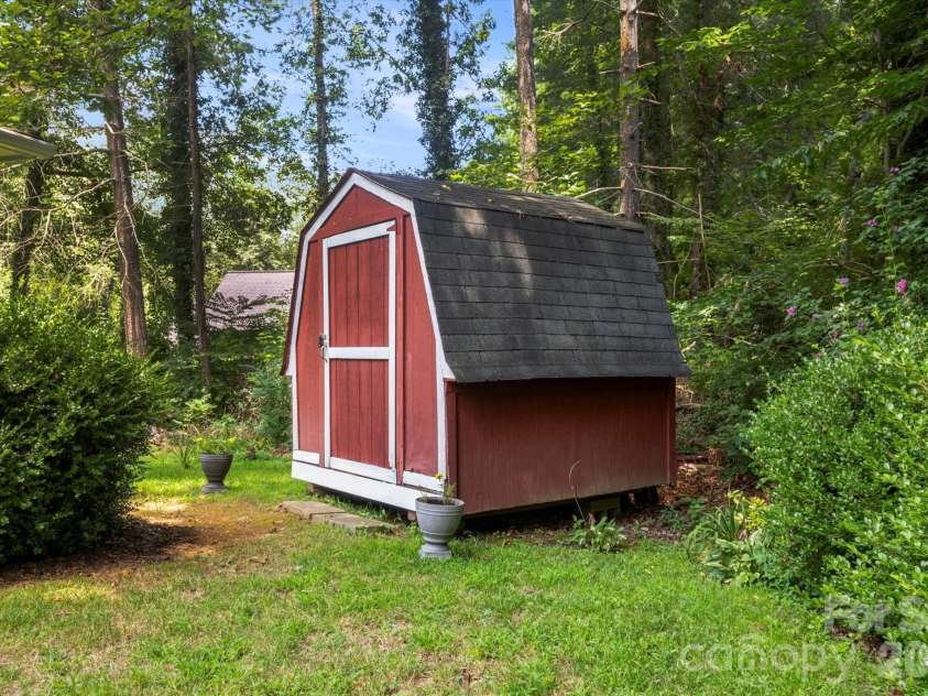 106 Laurel Lane, Etowah, NC 28729.  MLS# CAR4354319, YatesRealty ID 9161. Storage shed