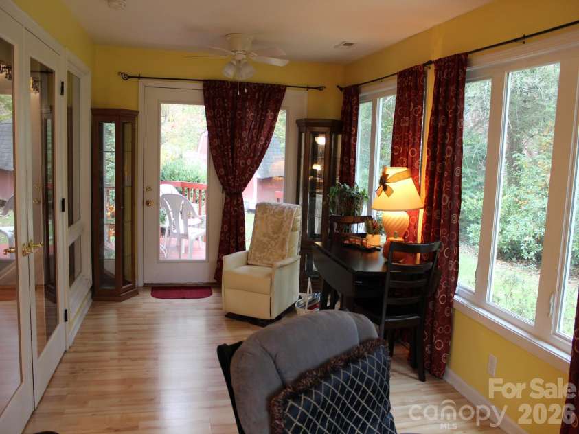 106 Laurel Lane, Etowah, NC 28729.  MLS# CAR4354319, YatesRealty ID 9161. Sunroom has door to deck