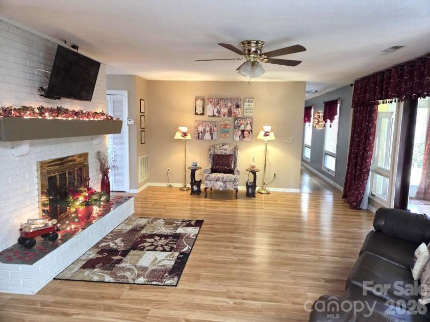 106 Laurel Lane, Etowah, NC 28729.  MLS# CAR4354319, YatesRealty ID 9161. Wood burning fireplace in living room