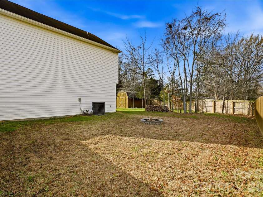228 Hollybrook Court, Salisbury, NC 28147.  MLS# CAR4321696, YatesRealty ID 9170. Firepit ready for relaxing evenings outdoors.