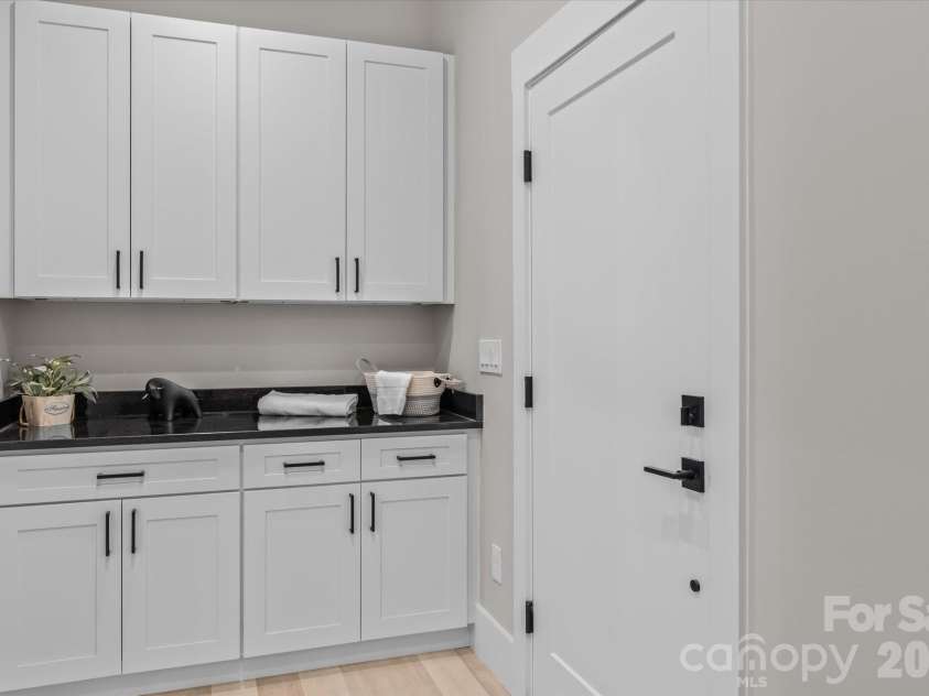 4435 Cornett Drive, Iron Station, NC 28080.  MLS# CAR4293184, YatesRealty ID 9172. Laundry Room w/Granite Counters