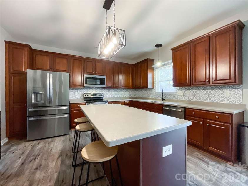 2005 Blue Iris Drive, Matthews, NC 28104.  MLS# CAR4350596, YatesRealty ID 9174. 