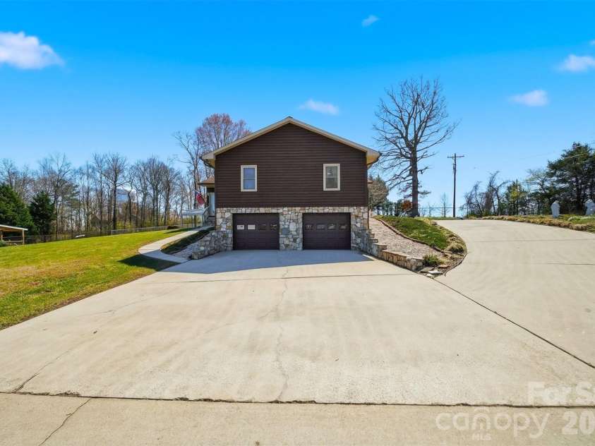 4716 Bert Huffman Drive, Granite Falls, NC 28630.  MLS# CAR4356442, YatesRealty ID 9177. 2 car garage! 