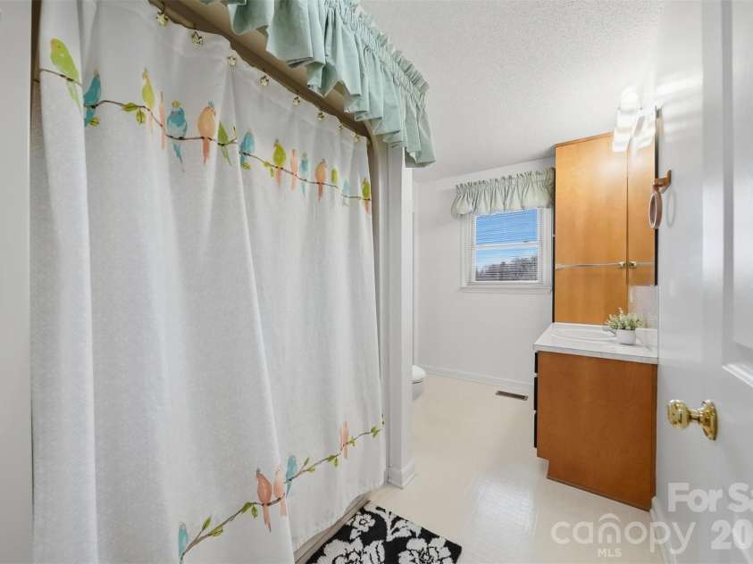 4716 Bert Huffman Drive, Granite Falls, NC 28630.  MLS# CAR4356442, YatesRealty ID 9177. 2nd bathroom 