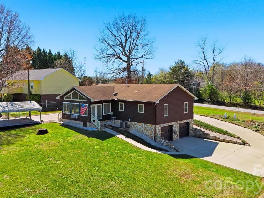 4716 Bert Huffman Drive, Granite Falls, NC 28630.  MLS# CAR4356442, YatesRealty ID 9177. Back of home!