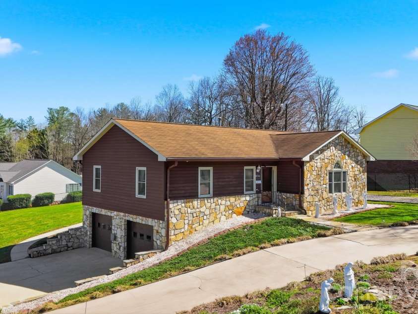 4716 Bert Huffman Drive, Granite Falls, NC 28630.  MLS# CAR4356442, YatesRealty ID 9177. Well maintained exterior featuring a 2 car garage! 