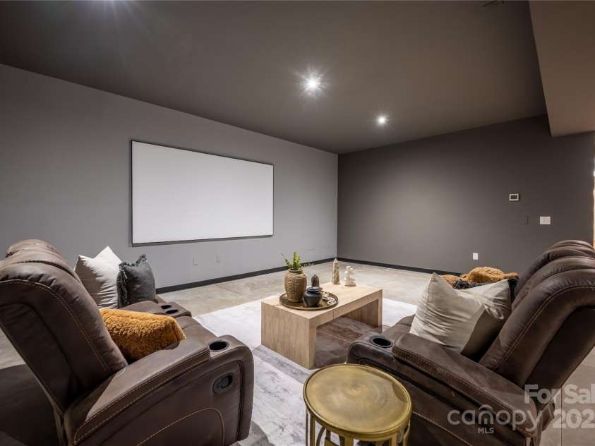 2804 Shenandoah Avenue, Charlotte, NC 28205.  MLS# CAR4321952, YatesRealty ID 918. Lower-level home theater.