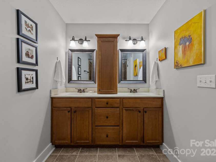 164 Deaver Street, Asheville, NC 28806.  MLS# CAR4249917, YatesRealty ID 9181. Primary ensuite bathroom with double vanity