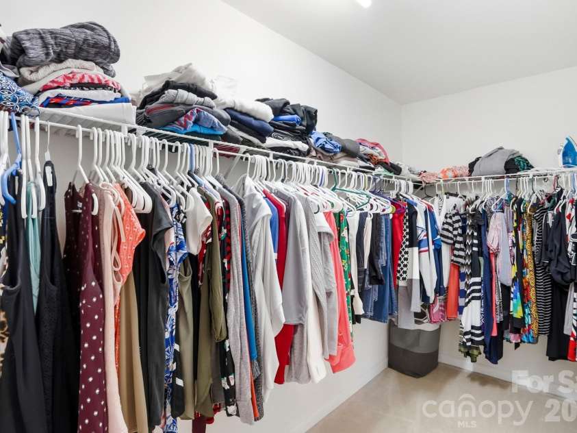 4723 Forestridge Commons Drive, Charlotte, NC 28269.  MLS# CAR4354187, YatesRealty ID 9187. Huge Primary Walk-In Closet. 