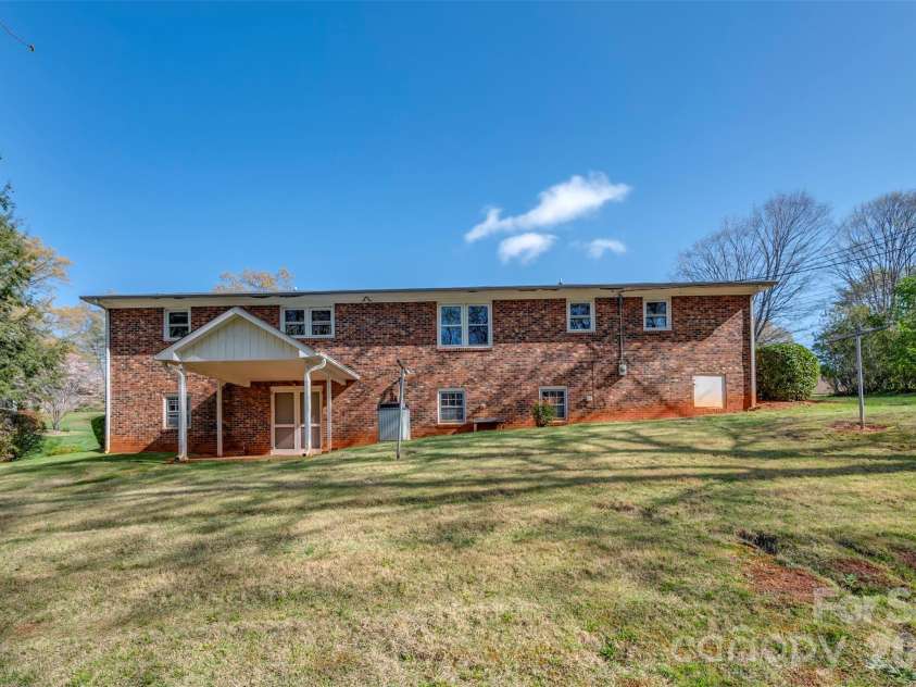 215 Windover Drive, Forest City, NC 28043.  MLS# CAR4362874, YatesRealty ID 9191. Back of Home