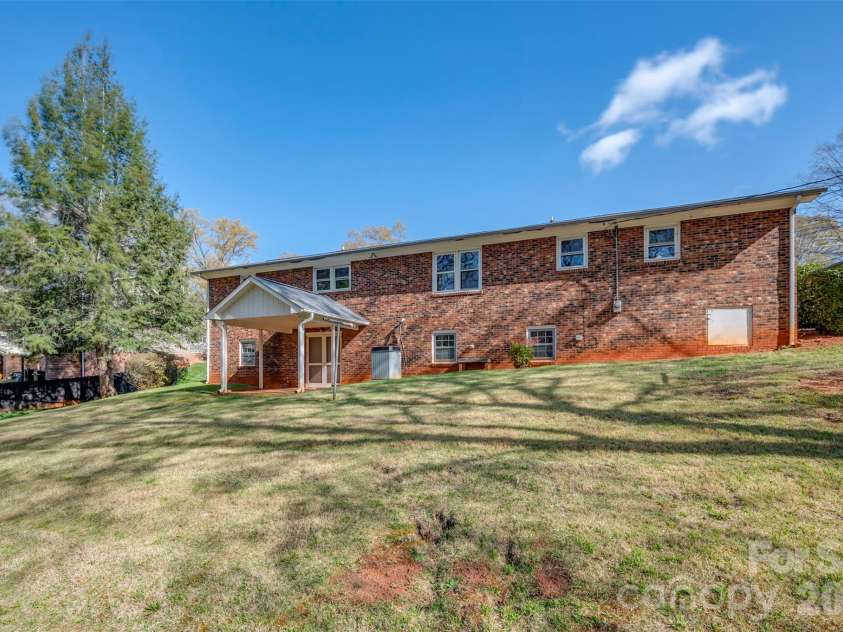 215 Windover Drive, Forest City, NC 28043.  MLS# CAR4362874, YatesRealty ID 9191. Back of Home