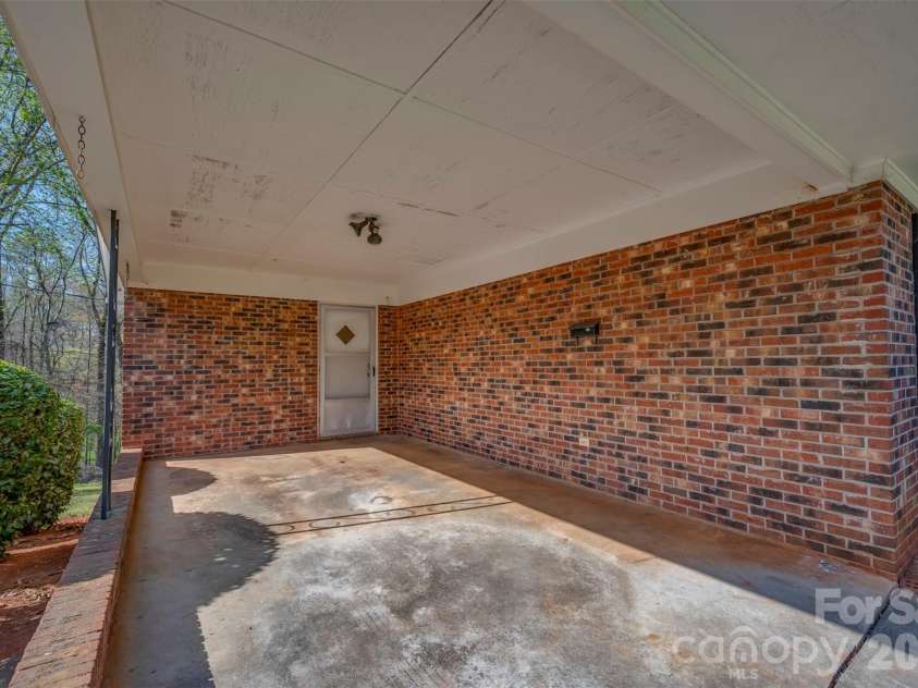 215 Windover Drive, Forest City, NC 28043.  MLS# CAR4362874, YatesRealty ID 9191. Carport
