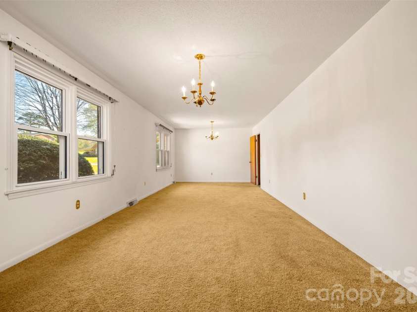 215 Windover Drive, Forest City, NC 28043.  MLS# CAR4362874, YatesRealty ID 9191. Dining Area/Living Room