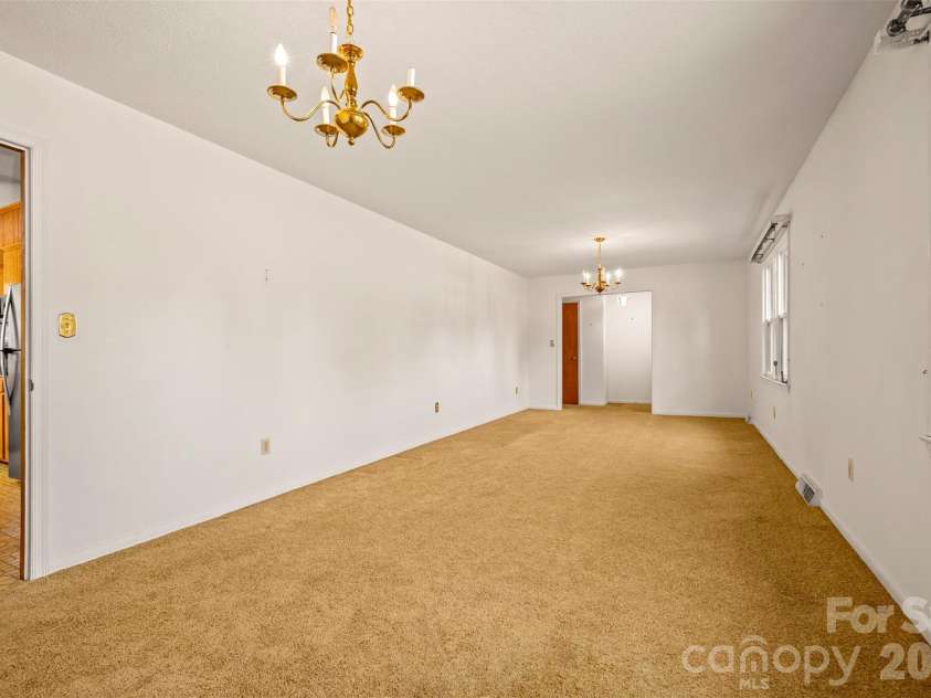 215 Windover Drive, Forest City, NC 28043.  MLS# CAR4362874, YatesRealty ID 9191. Dining Area/Living Room