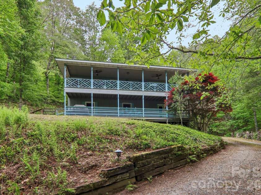 210 Spring Valley Drive, Mars Hill, NC 28754.  MLS# CAR4337752, YatesRealty ID 9192. Double covered decks for outdoor living.