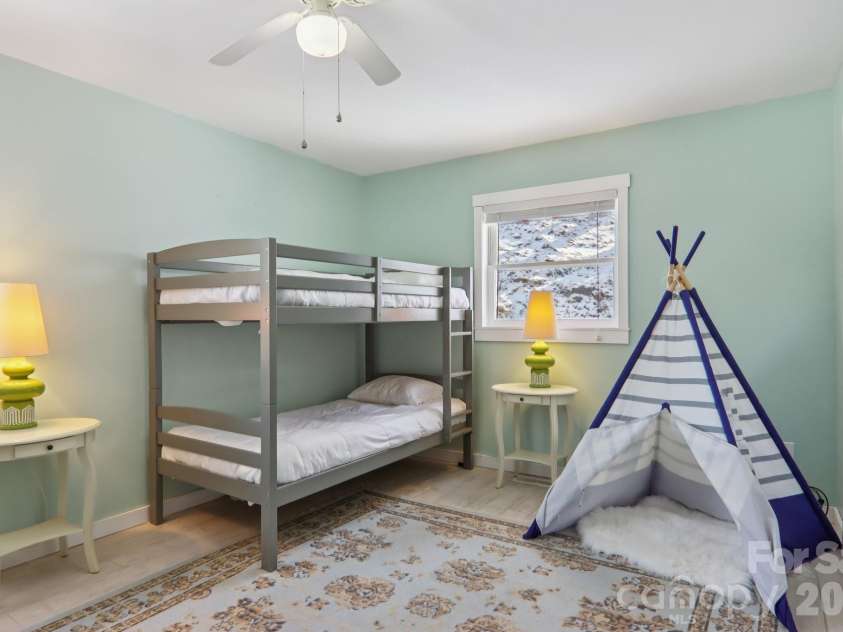 210 Spring Valley Drive, Mars Hill, NC 28754.  MLS# CAR4337752, YatesRealty ID 9192. Downstairs bonus room.