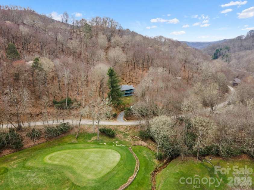 210 Spring Valley Drive, Mars Hill, NC 28754.  MLS# CAR4337752, YatesRealty ID 9192. Golf Course and creek.