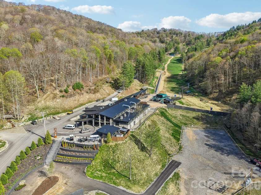 210 Spring Valley Drive, Mars Hill, NC 28754.  MLS# CAR4337752, YatesRealty ID 9192. Hatley Pointe Resort with year round fine dining.