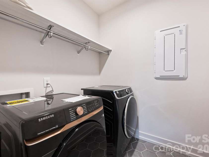 1500 Hawthorne Lane, Charlotte, NC 28205.  MLS# CAR4364740, YatesRealty ID 9199. Upper Level Laundry Room