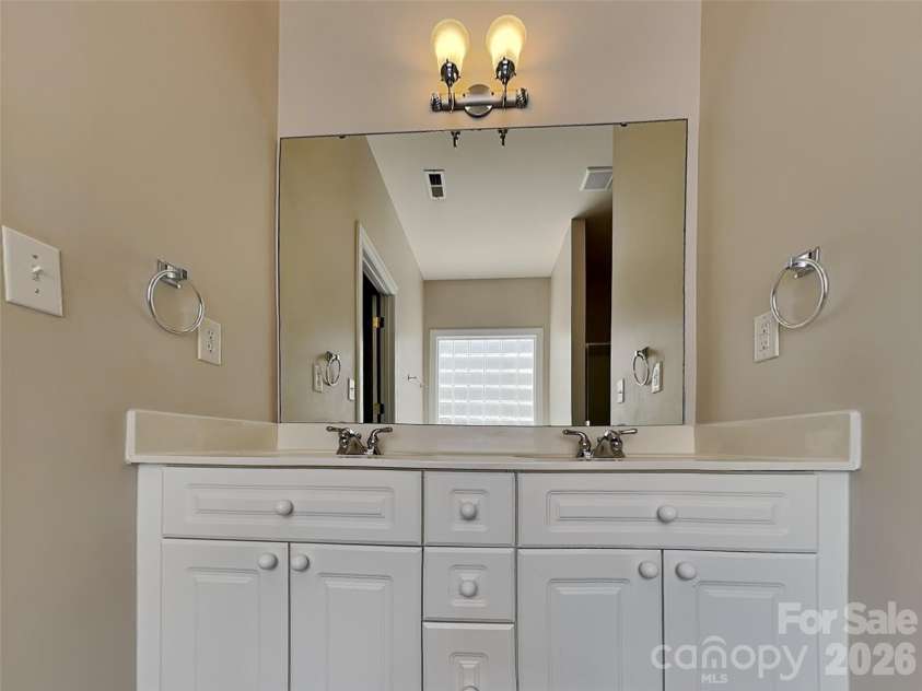 1004 Sentinel Drive, Indian Trail, NC 28079.  MLS# CAR4366456, YatesRealty ID 9202. Primary bathroom