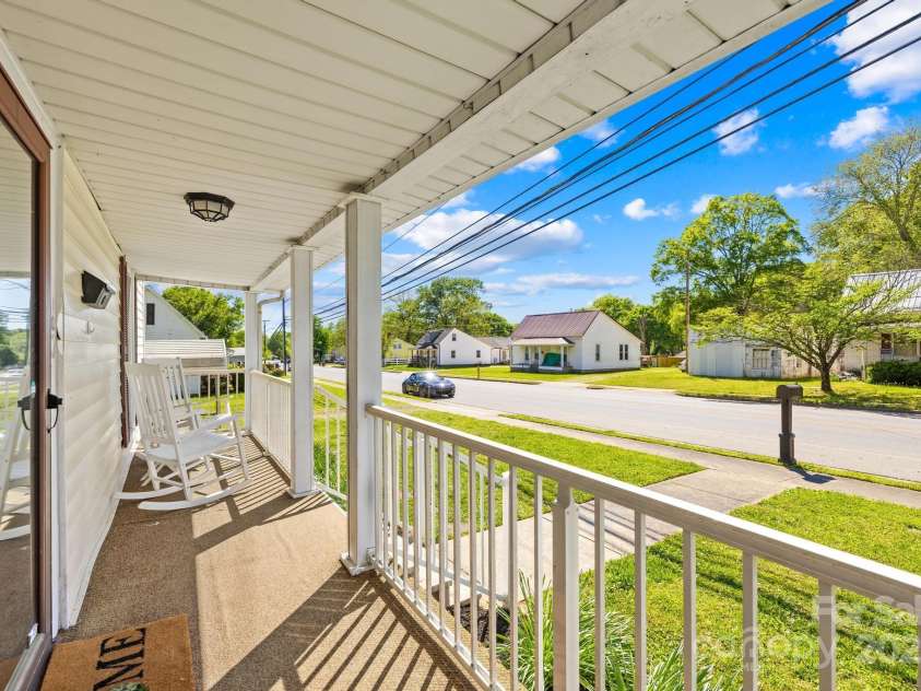 406 Gaston Street, Dallas, NC 28034.  MLS# CAR4249634, YatesRealty ID 9204. Front porch sitting