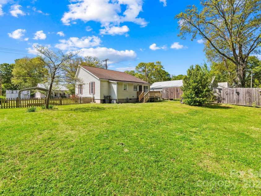 406 Gaston Street, Dallas, NC 28034.  MLS# CAR4249634, YatesRealty ID 9204. Spacious fenced in backyard