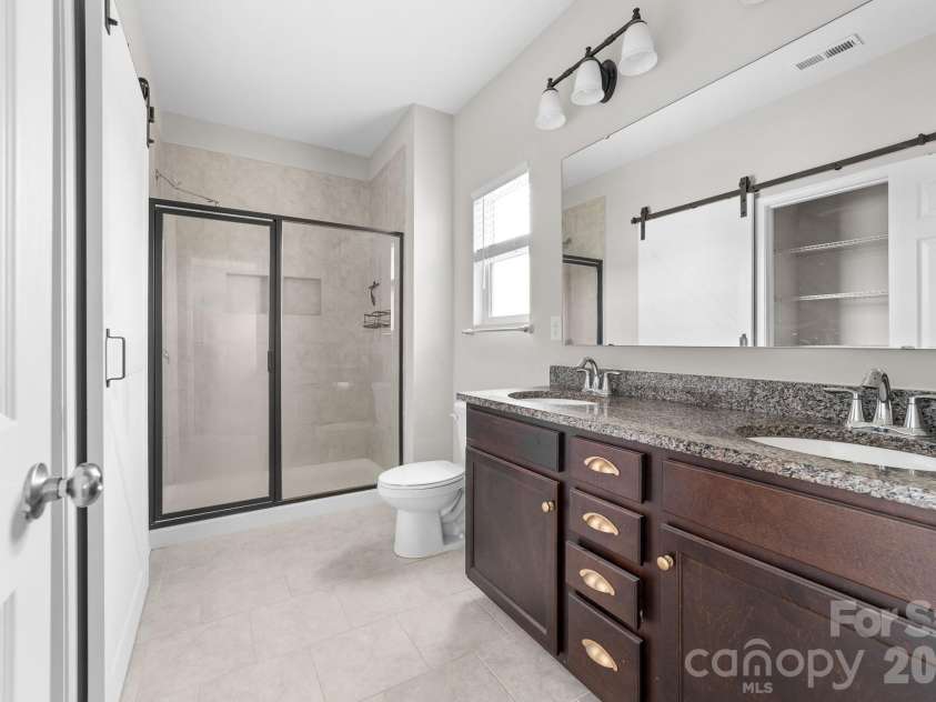 5145 Thomasville Drive, Belmont, NC 28012.  MLS# CAR4361969, YatesRealty ID 9204. Primary Bath