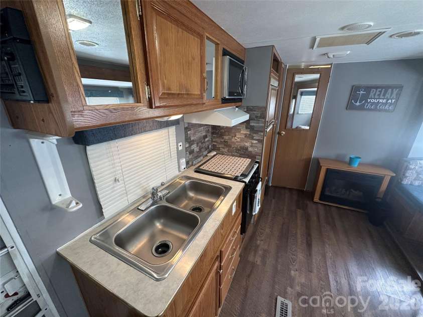109 Pine Street, New London, NC 28127.  MLS# CAR4366175, YatesRealty ID 9207. 