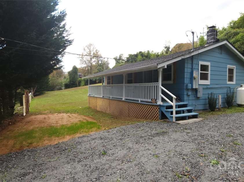 75 Peake Street, Tryon, NC 28782.  MLS# CAR4199497, YatesRealty ID 9207. 