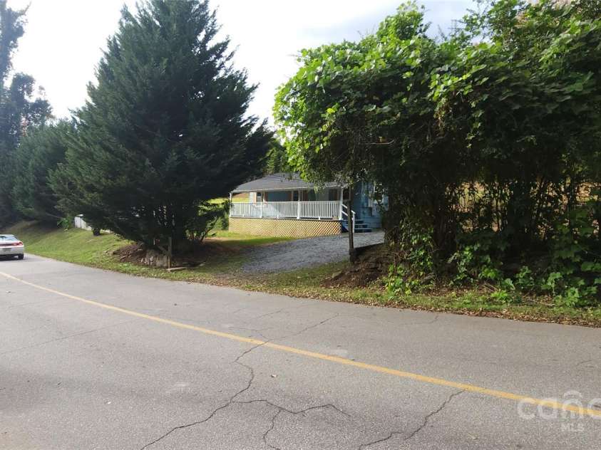 75 Peake Street, Tryon, NC 28782.  MLS# CAR4199497, YatesRealty ID 9207. 