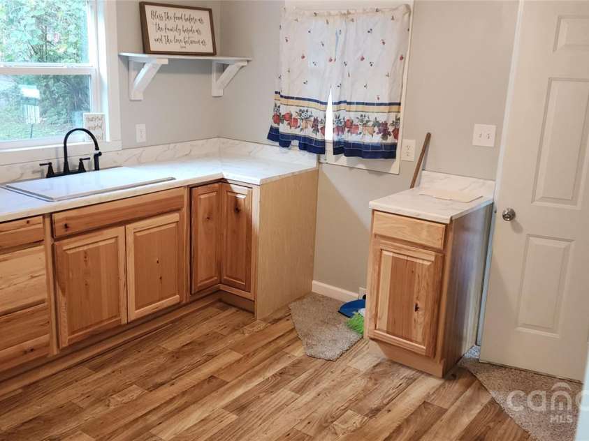 75 Peake Street, Tryon, NC 28782.  MLS# CAR4199497, YatesRealty ID 9207. 