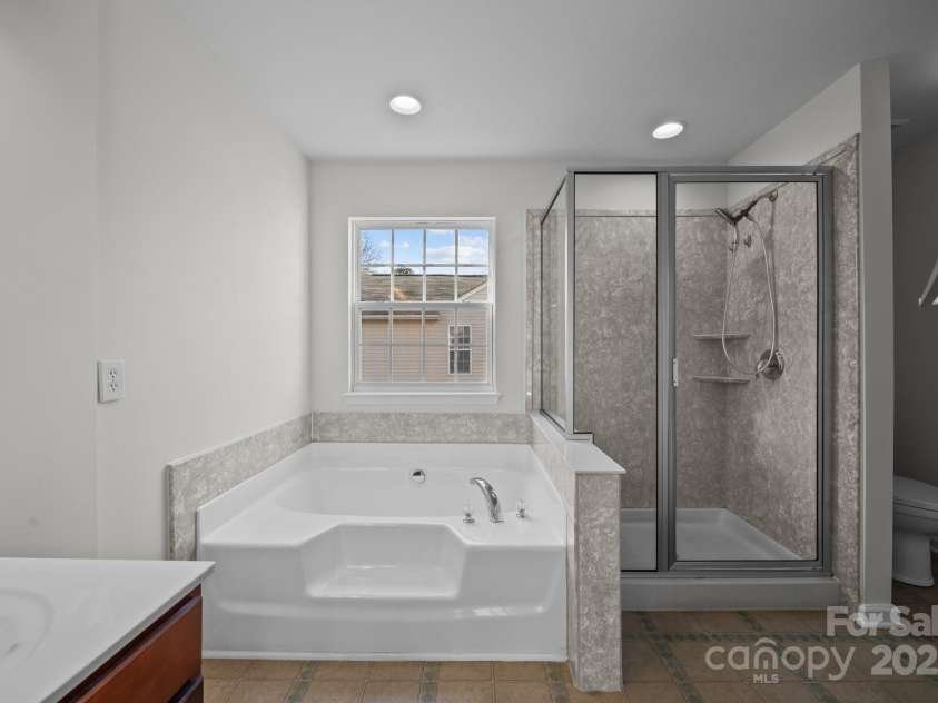 7007 Church Wood Lane, Huntersville, NC 28078.  MLS# CAR4221058, YatesRealty ID 9208. Primary Bathroom