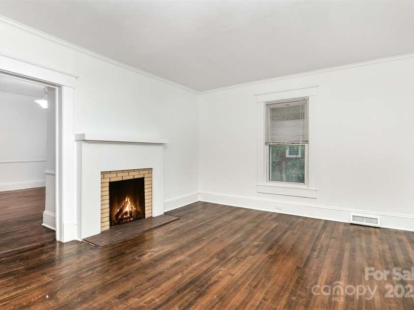 425 Maupin Avenue, Salisbury, NC 28144.  MLS# CAR4194348, YatesRealty ID 921. Formal living room with fireplace