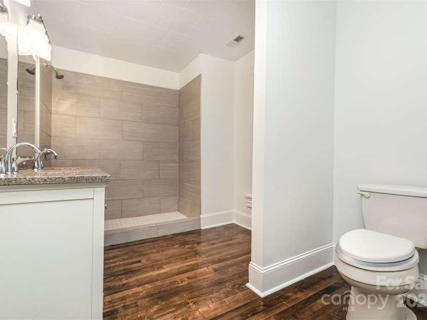 425 Maupin Avenue, Salisbury, NC 28144.  MLS# CAR4194348, YatesRealty ID 921. Walk-in tile shower in primary bath up