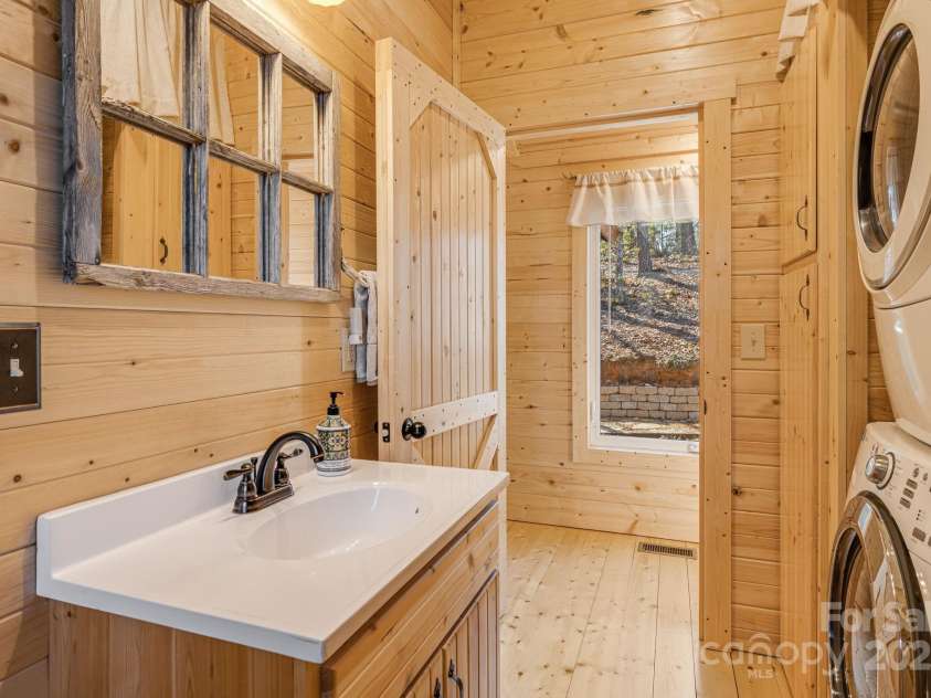 81 Delind Drive, Mill Spring, NC 28756.  MLS# CAR4332476, YatesRealty ID 9222. 