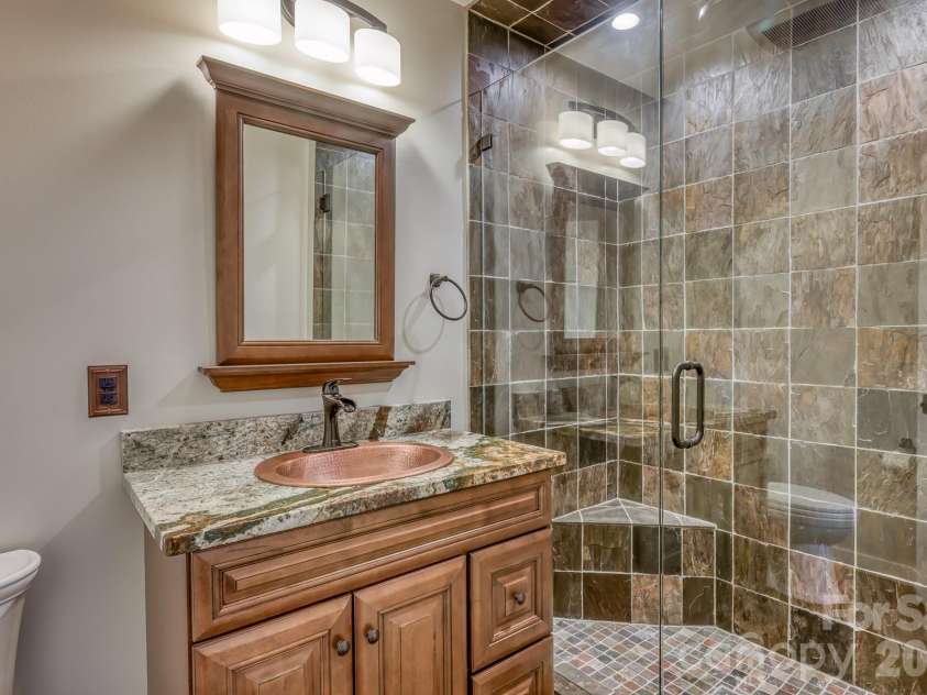 294 Martha Drive, Spruce Pine, NC 28777.  MLS# CAR4366668, YatesRealty ID 9228. Downstairs