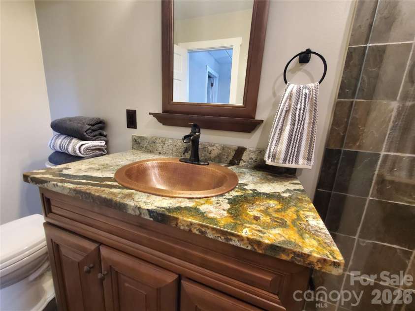 294 Martha Drive, Spruce Pine, NC 28777.  MLS# CAR4366668, YatesRealty ID 9228. Downstairs