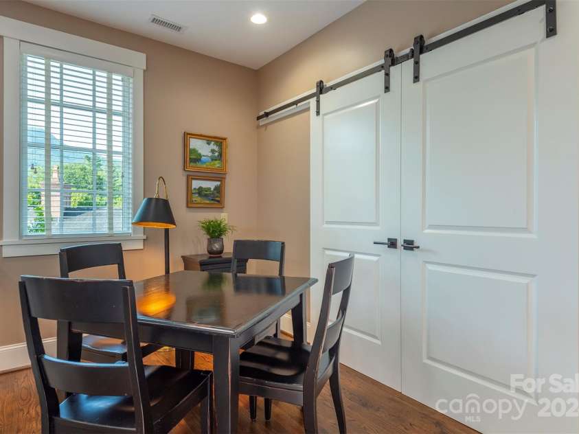 13 Fitzgerald Road, Black Mountain, NC 28711.  MLS# CAR4176177, YatesRealty ID 9244. Barn doors to close off family room.