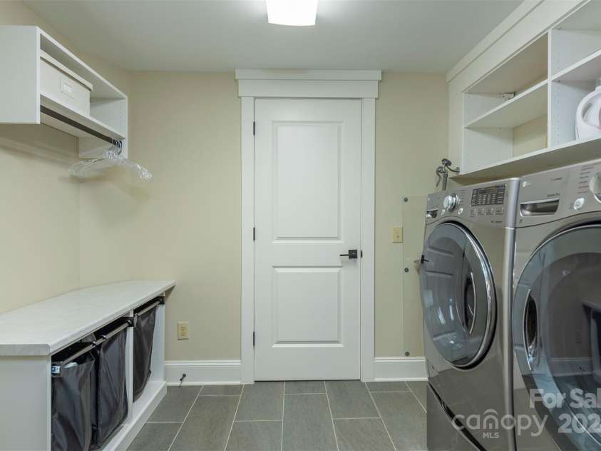 13 Fitzgerald Road, Black Mountain, NC 28711.  MLS# CAR4176177, YatesRealty ID 9244. Laundry room.