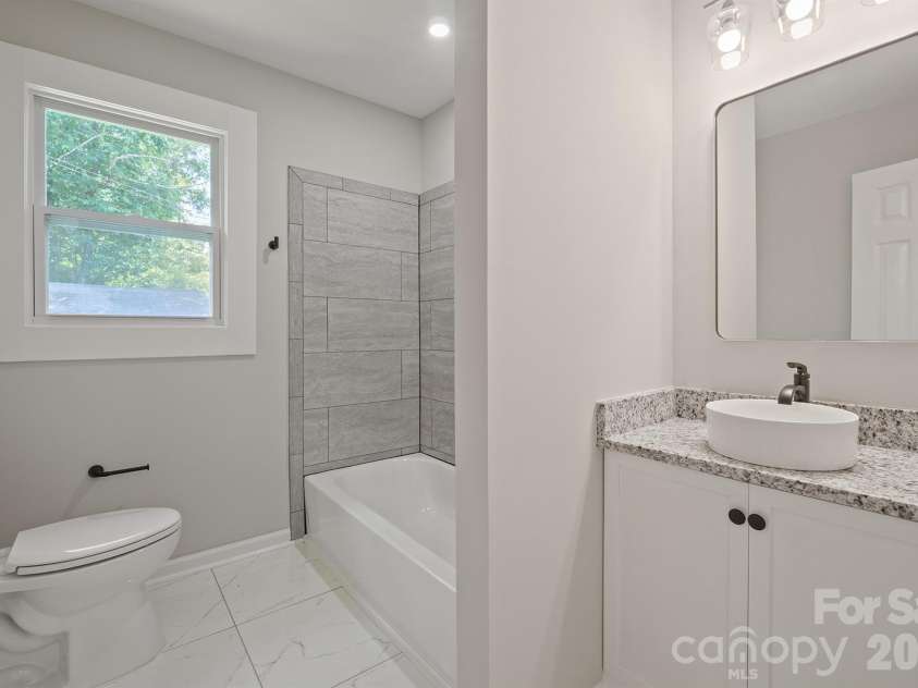 841 Murphy Street, Kannapolis, NC 28081.  MLS# CAR4391730, YatesRealty ID 9245. Hall Bathroom