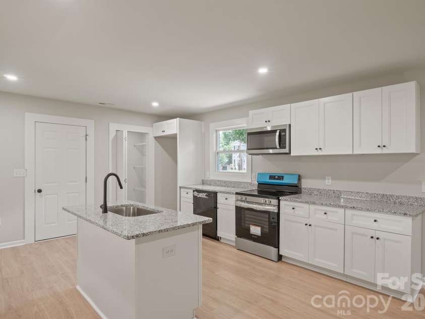 841 Murphy Street, Kannapolis, NC 28081.  MLS# CAR4391730, YatesRealty ID 9245. Kitchen with Island
