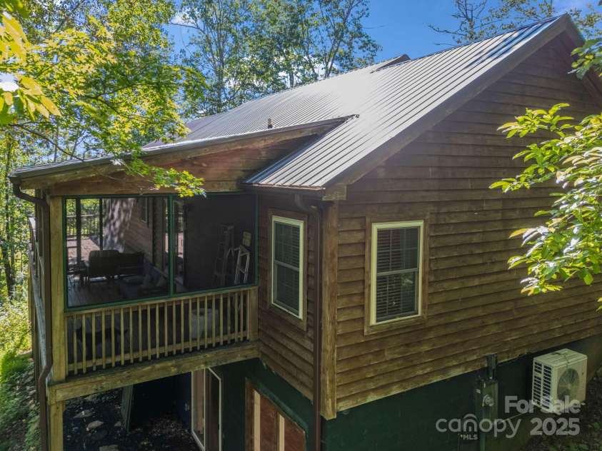288 Long Ridge Road, Old Fort, NC 28762.  MLS# CAR4297306, YatesRealty ID 9246. Spacious covered rear deck.