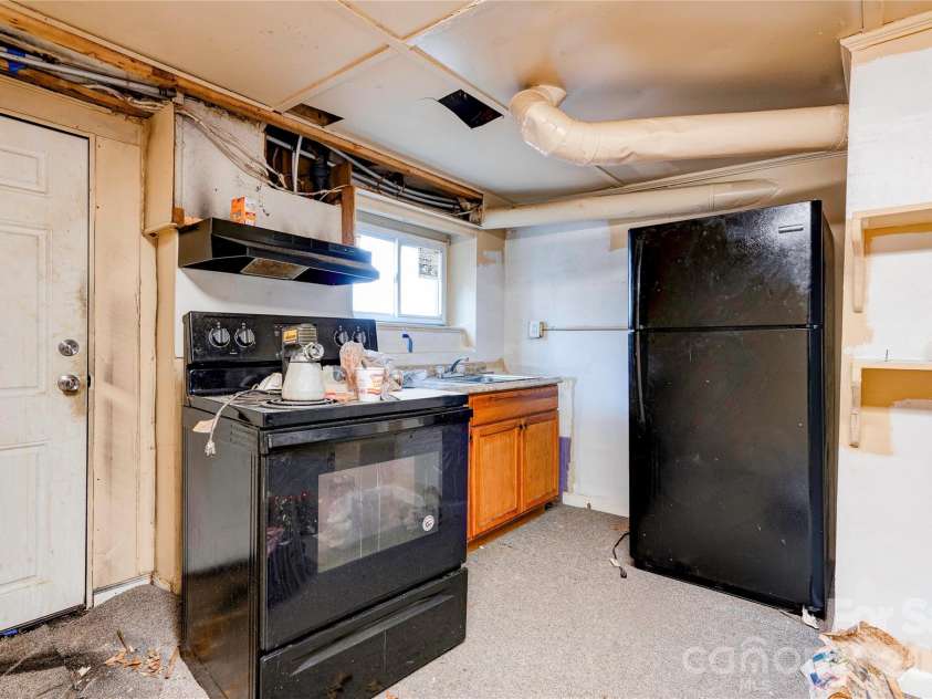 704 Earl Road, Shelby, NC 28150.  MLS# CAR4325482, YatesRealty ID 9248. Basement 