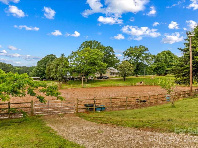 296 Hicks Creek Road, Troutman, NC 28166.  MLS# CAR4266143, YatesRealty ID 925. 110' x 250' Lighted Riding Arena