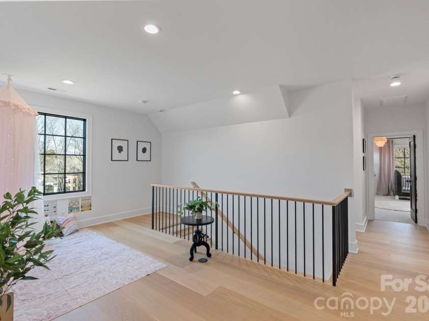 20320 Havenview Drive, Cornelius, NC 28031.  MLS# CAR4342352, YatesRealty ID 9251. Loft landing area for play or study.